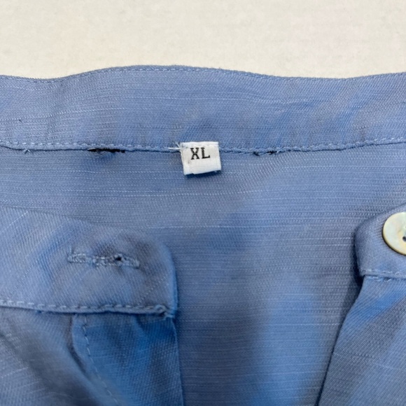 Women size XL Blue long sleeve button up loose fitting shirt. Gently used. - Picture 12 of 15